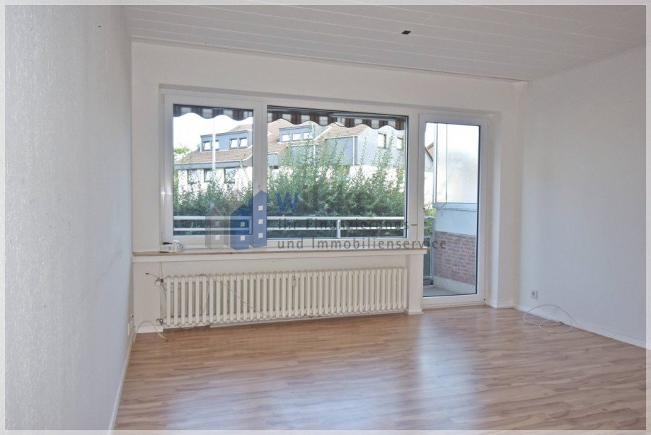 Wohnzimmer mit Zugang z. Balkon Erdgeschosswohnung Ratingen